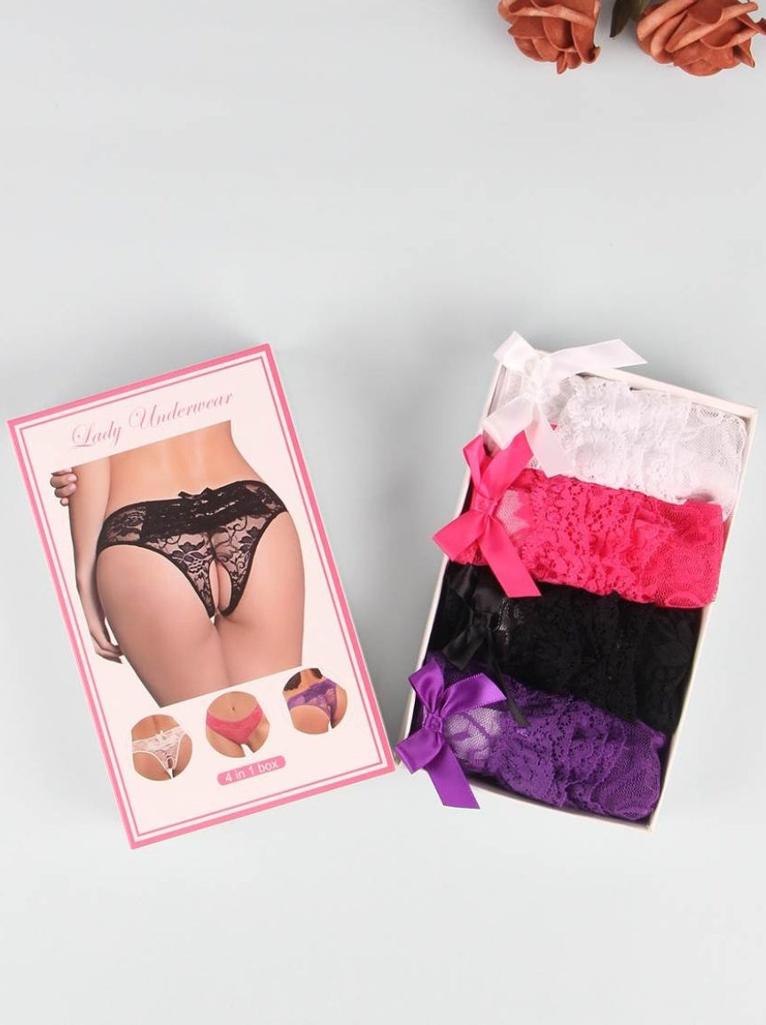Box of lace underwear with packaging displaying images of the product on a light gray background.