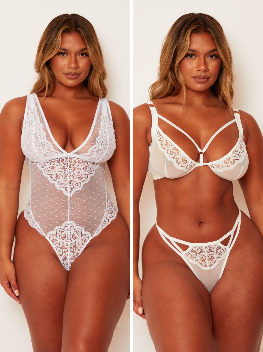 White lace lingerie set on a model against a white background